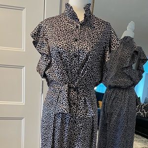Short sleeve ruffle top satin leopard one piece pant suit.